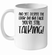 Product And yet despite the look on my face you're still talking White Ceramic Mug