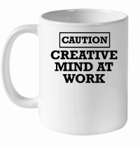 Product Caution creative mind at work White Ceramic Mug